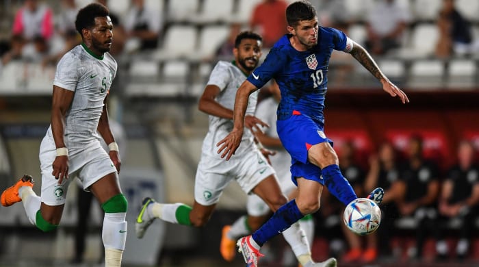 Christian Pulisic playing against Saudi Arabia.